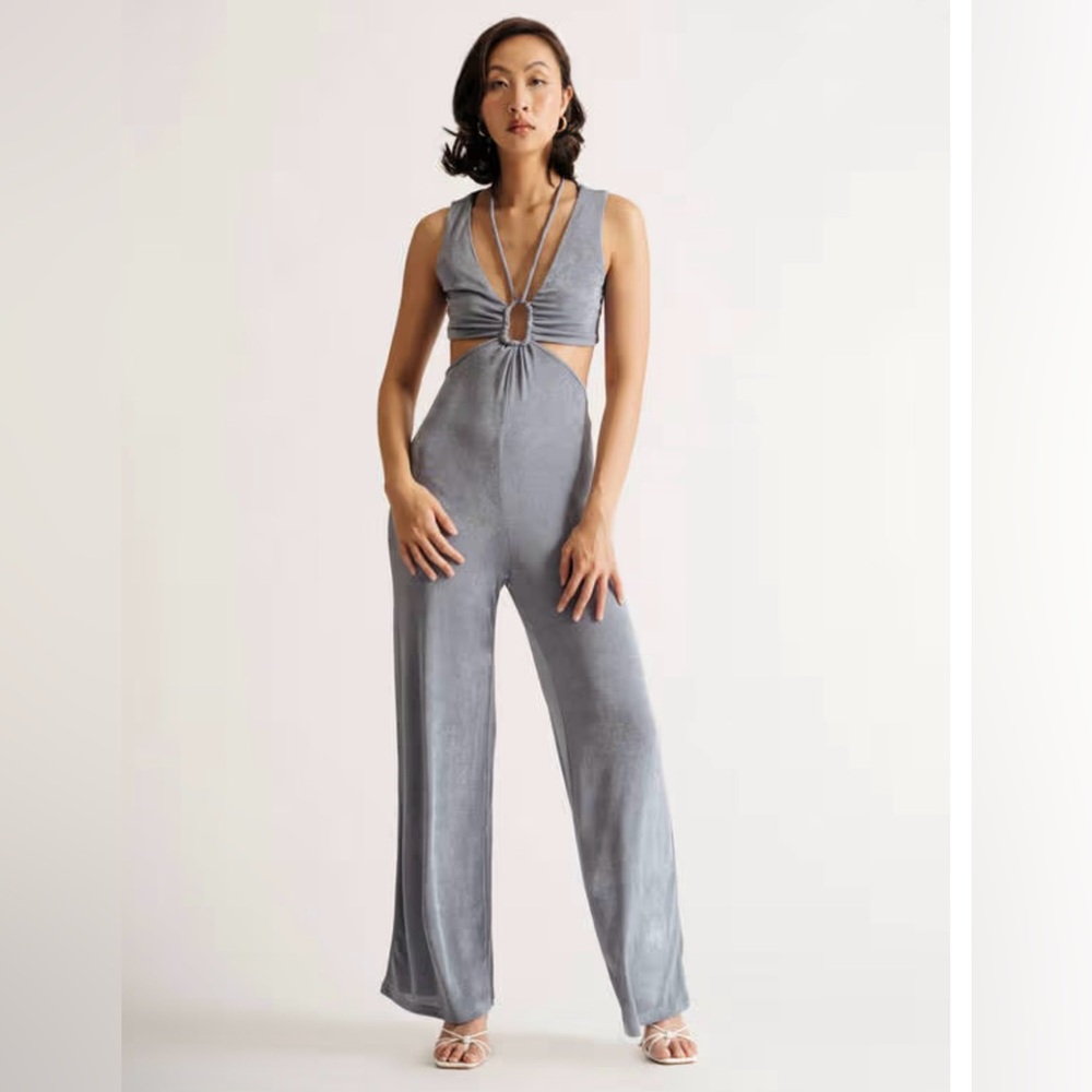 Endless Blu- Cut out silhouette Cross strap Sleeveless Jumpsuit size Small
